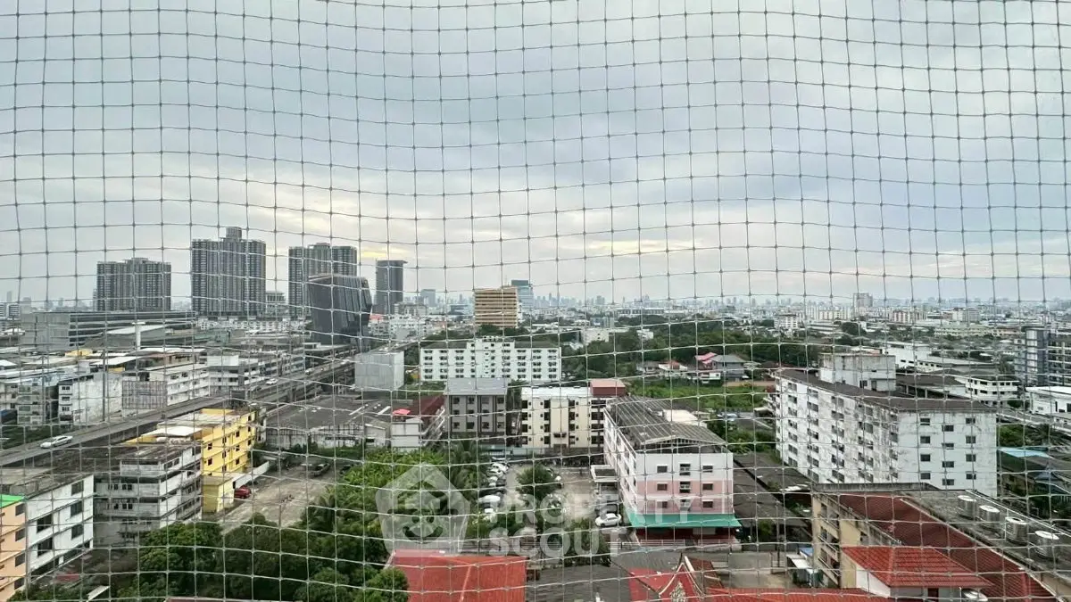 Stunning cityscape view from high-rise building with expansive skyline and urban landscape.
