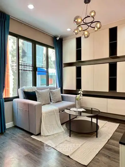 Modern living room with stylish furniture and elegant lighting