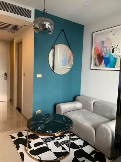 Stylish modern living room with chic decor and abstract art