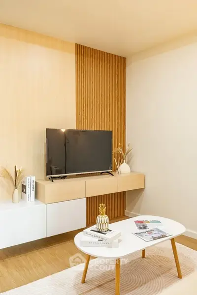 Modern living room with stylish decor and sleek TV setup