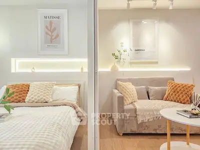 Cozy modern bedroom and living area with stylish decor and soft lighting.