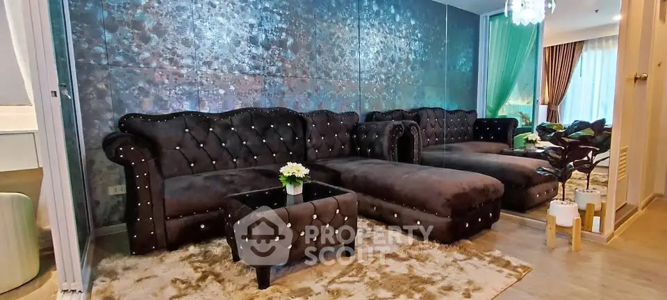 Luxurious living room with plush brown sofas and elegant decor