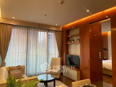 Luxurious living room with elegant decor and large windows in modern apartment