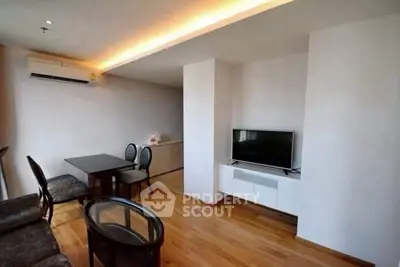 Modern living room with sleek furniture and ambient lighting