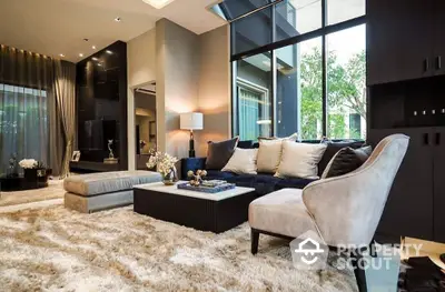 Luxurious modern living room with plush carpet and elegant furniture