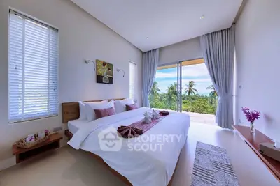 Luxurious bedroom with stunning tropical view and elegant decor