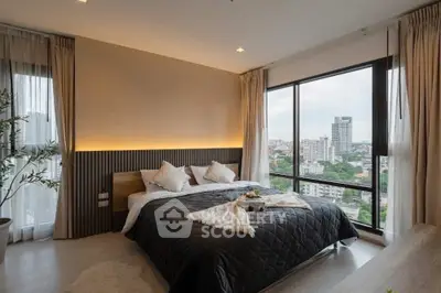 Luxurious bedroom with panoramic city view and elegant decor