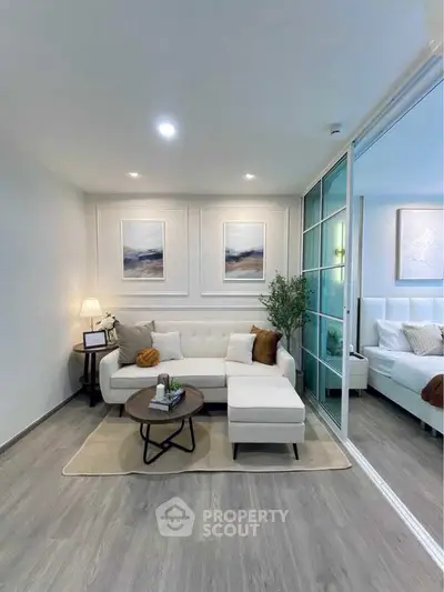 Modern living room with elegant decor and cozy white sectional sofa