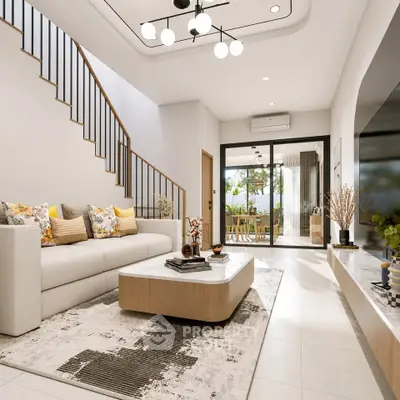Stylish modern living room with elegant staircase and cozy seating area.