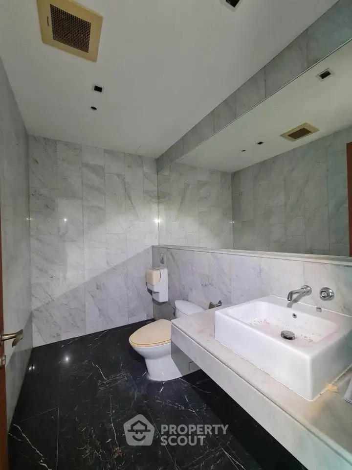 Luxurious marble bathroom with modern fixtures and sleek design