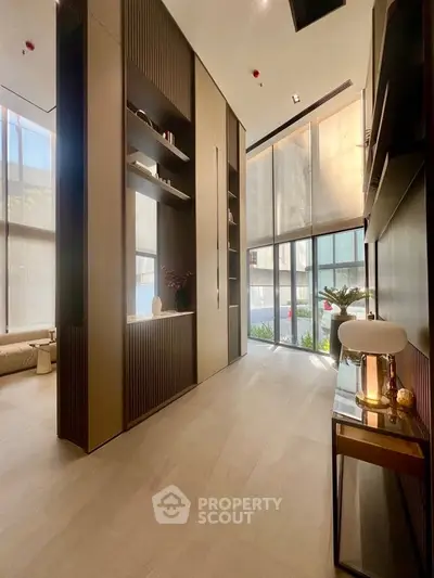 Luxurious modern living room with high ceilings and elegant decor