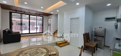 Spacious modern living room with stylish wooden accents and open layout