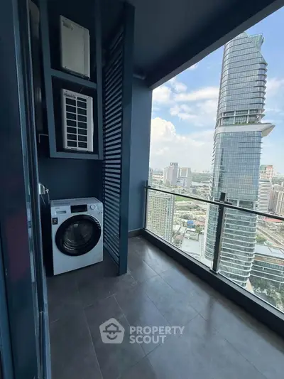 Modern high-rise balcony with washing machine and stunning city view