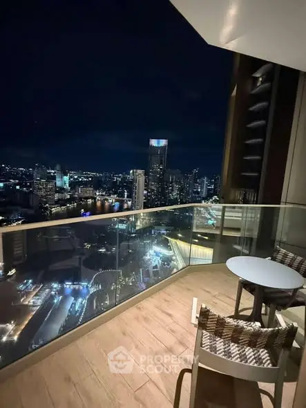 Stunning city skyline view from a modern balcony at night, perfect for urban living.