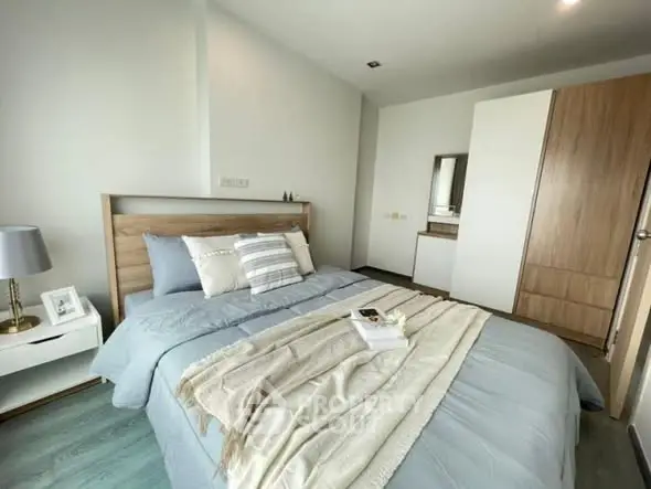 Modern bedroom with cozy bedding and stylish decor