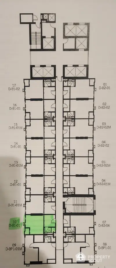 Detailed floor plan of a modern apartment building with highlighted unit for sale.