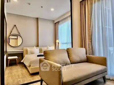 Stylish modern bedroom with cozy sofa and elegant decor