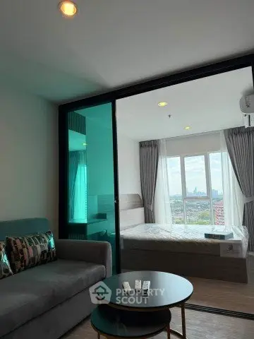 Modern studio apartment with glass partition and city view
