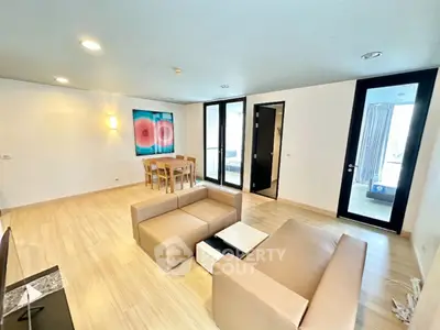 Spacious modern living room with stylish furniture and natural light