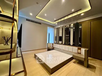 Luxurious modern bedroom with elegant lighting and mirrored accents