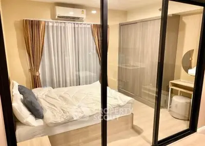 Modern bedroom with glass partition and stylish decor