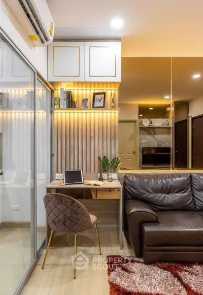 Modern living room with stylish decor, cozy seating, and a functional study area, perfect for urban living.