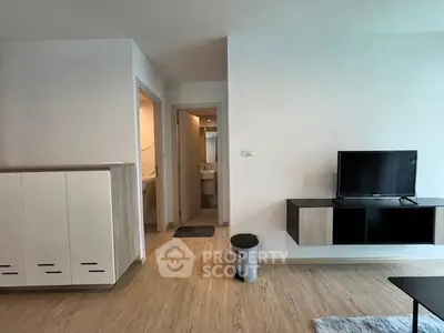 Modern living room with sleek TV stand and minimalist decor