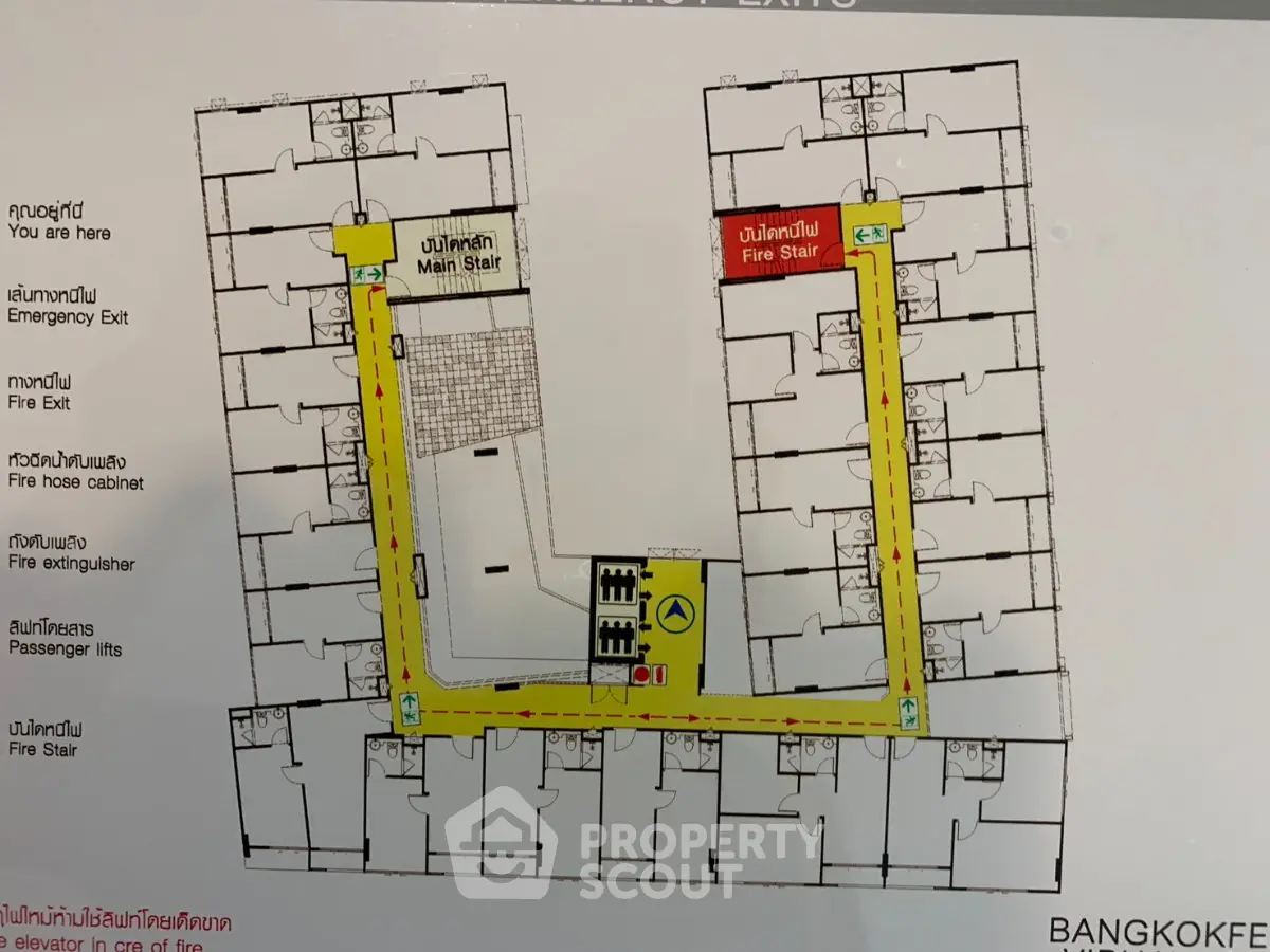 Detailed floor plan of a building in Bangkok with emergency exits and stair locations.