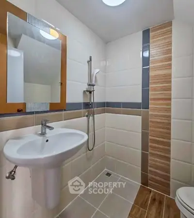 Modern bathroom with sleek fixtures and stylish tile design