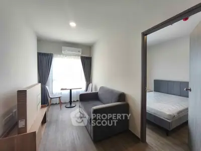 Modern apartment interior with cozy living room and bedroom