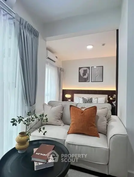 Stylish modern living room with cozy sofa and elegant decor