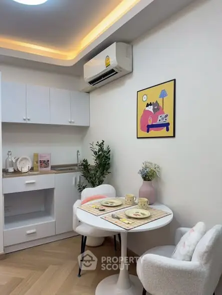 Charming kitchen nook with modern decor and cozy dining setup.