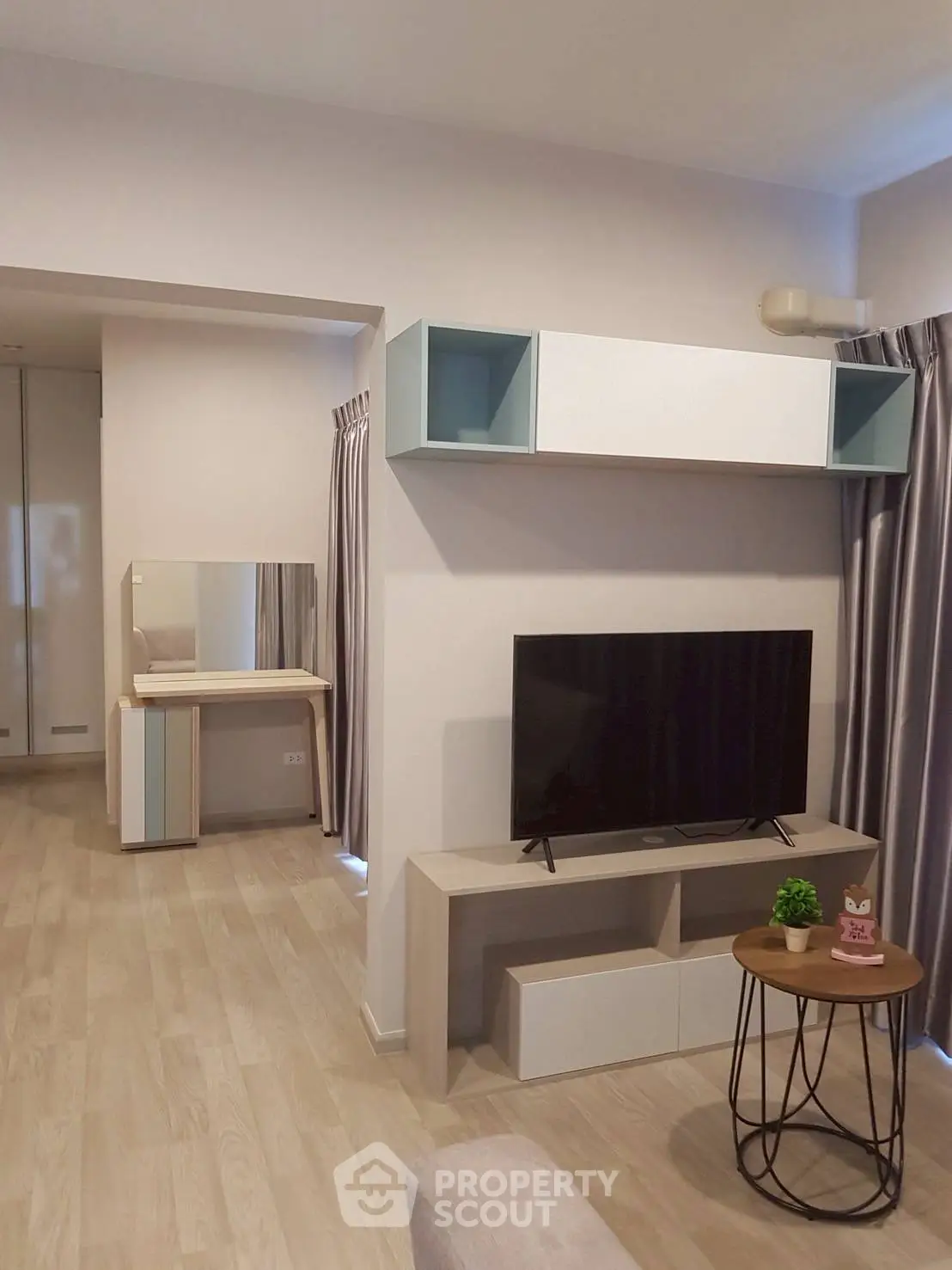 Modern living room with sleek TV stand and stylish decor