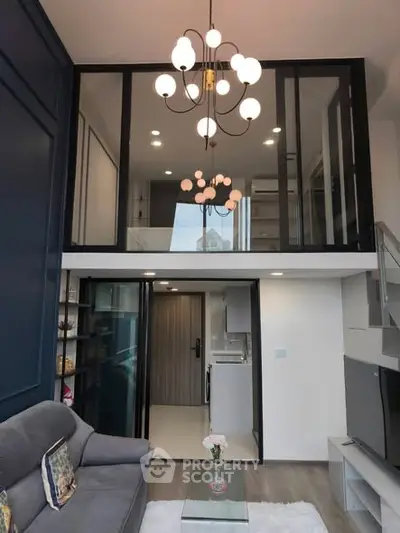 Modern loft apartment with stylish lighting and open layout