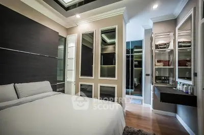 Luxurious bedroom with modern design and ample storage space