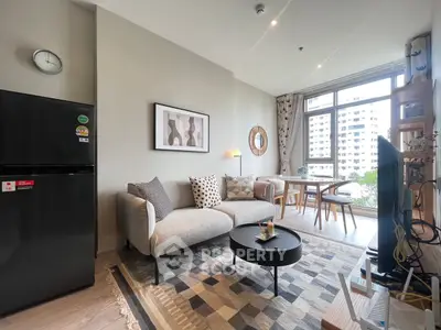 Modern living room with stylish decor and large window view