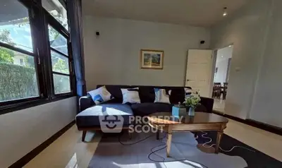 Stylish living room with modern sofa and natural light