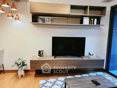 Modern living room with sleek TV setup and stylish decor