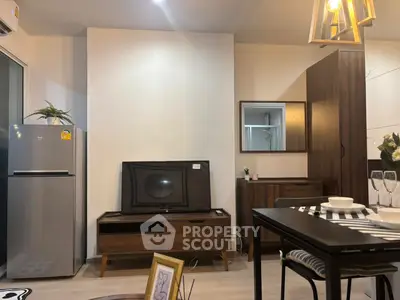 Modern living room with stylish furniture and dining area