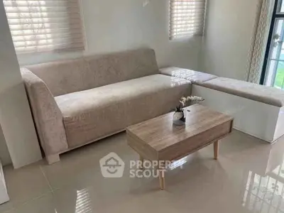 Modern living room with sleek sofa and stylish coffee table
