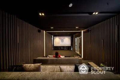 Luxurious home theater with plush seating and ambient lighting