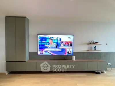 Modern living room with sleek TV unit and minimalist decor
