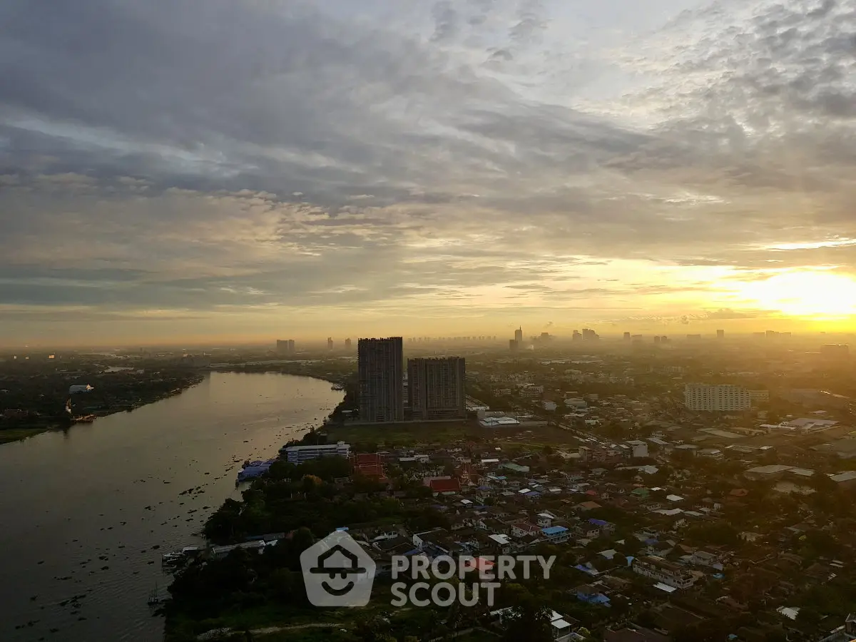 Stunning cityscape view at sunset with river and skyline