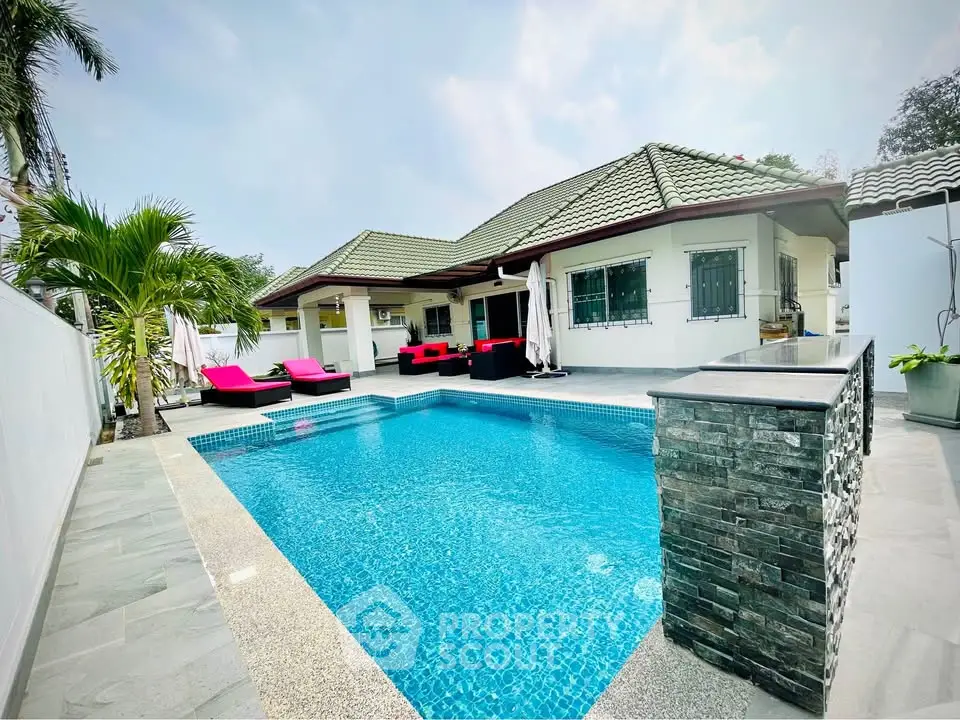 Luxurious villa with private pool and stylish outdoor seating area