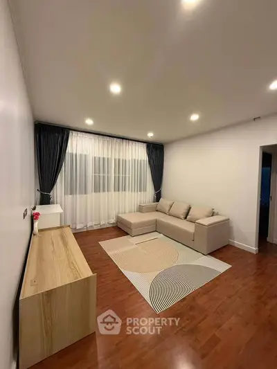 Modern living room with elegant decor and cozy seating area