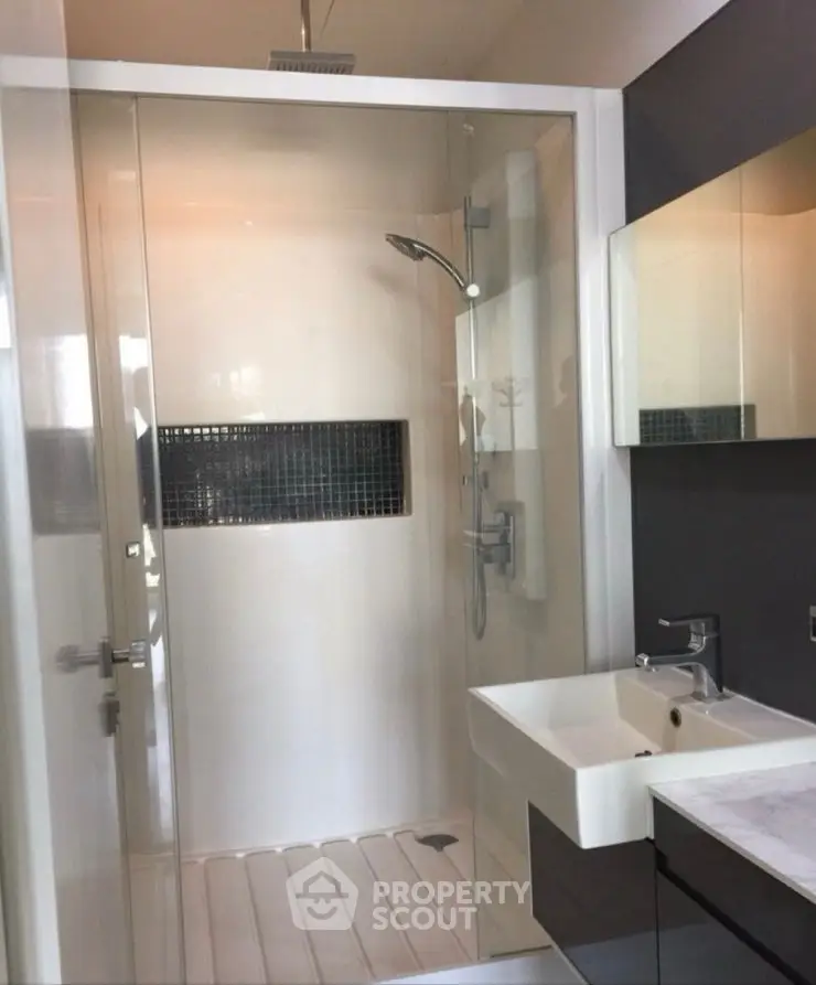 Modern bathroom with sleek fixtures and stylish tile accents