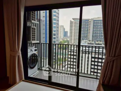 Modern apartment balcony with city view and washing machine