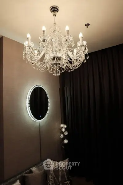 Elegant living room with luxurious chandelier and modern decor