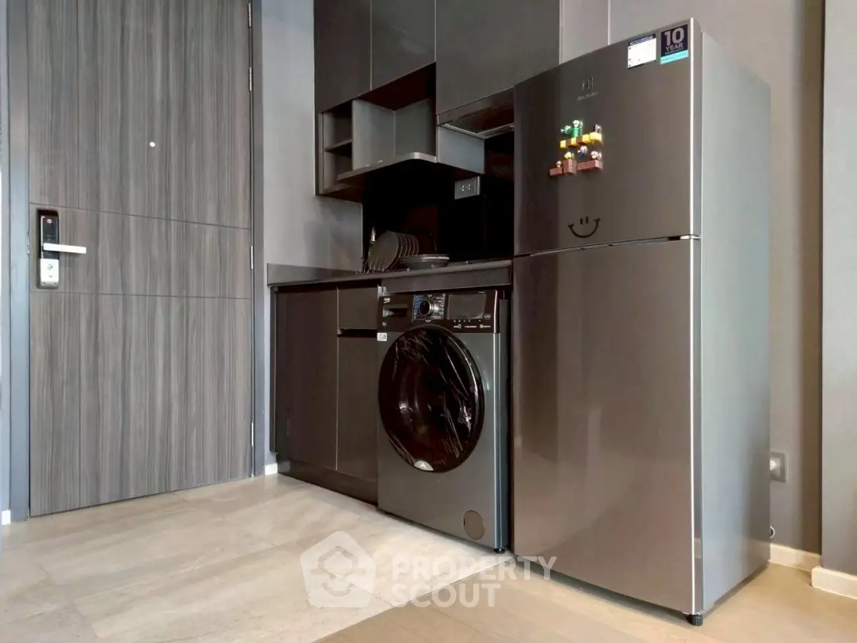 Modern kitchen with sleek appliances and stylish cabinetry