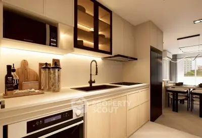 Modern kitchen with sleek cabinetry and built-in appliances in a stylish open layout.